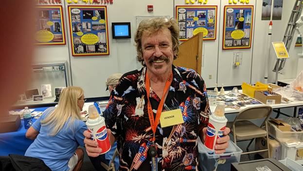 Veteran Cape Photographer And Vendor Carleton Bailie Holding Two Pepsi One Giant Sip For Mankind Soda Dispenser Replicas, Photo Courtesy Cliff Lethbridge Spaceline