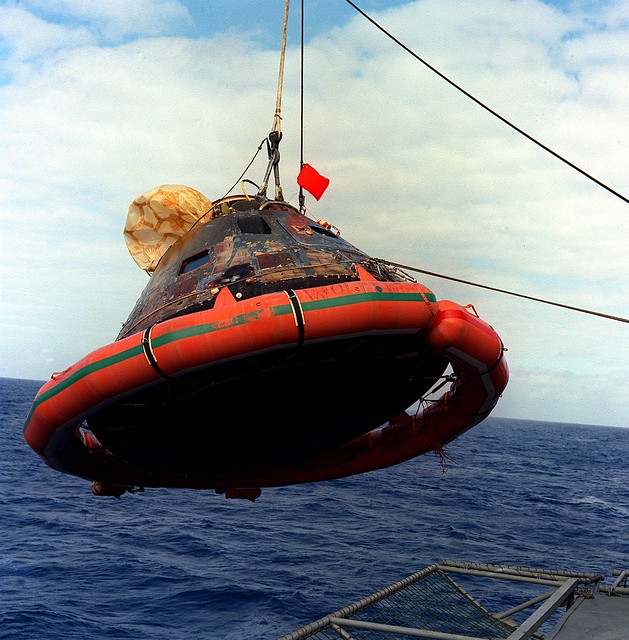 Apollo 11 Command Module Hoisted Aboard Recovery Vessel, File Photo Courtesy NASA